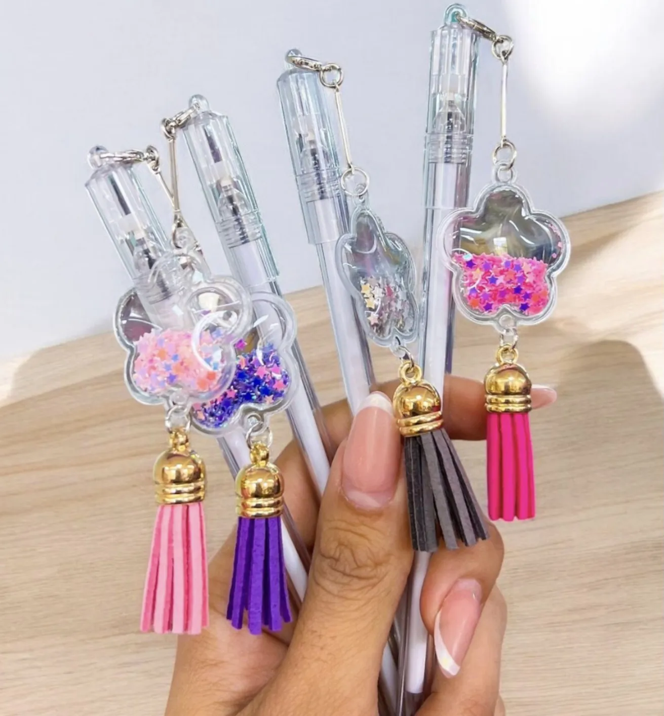 Esfero Flor con escarcha – diseño retráctil con borla y charm x2