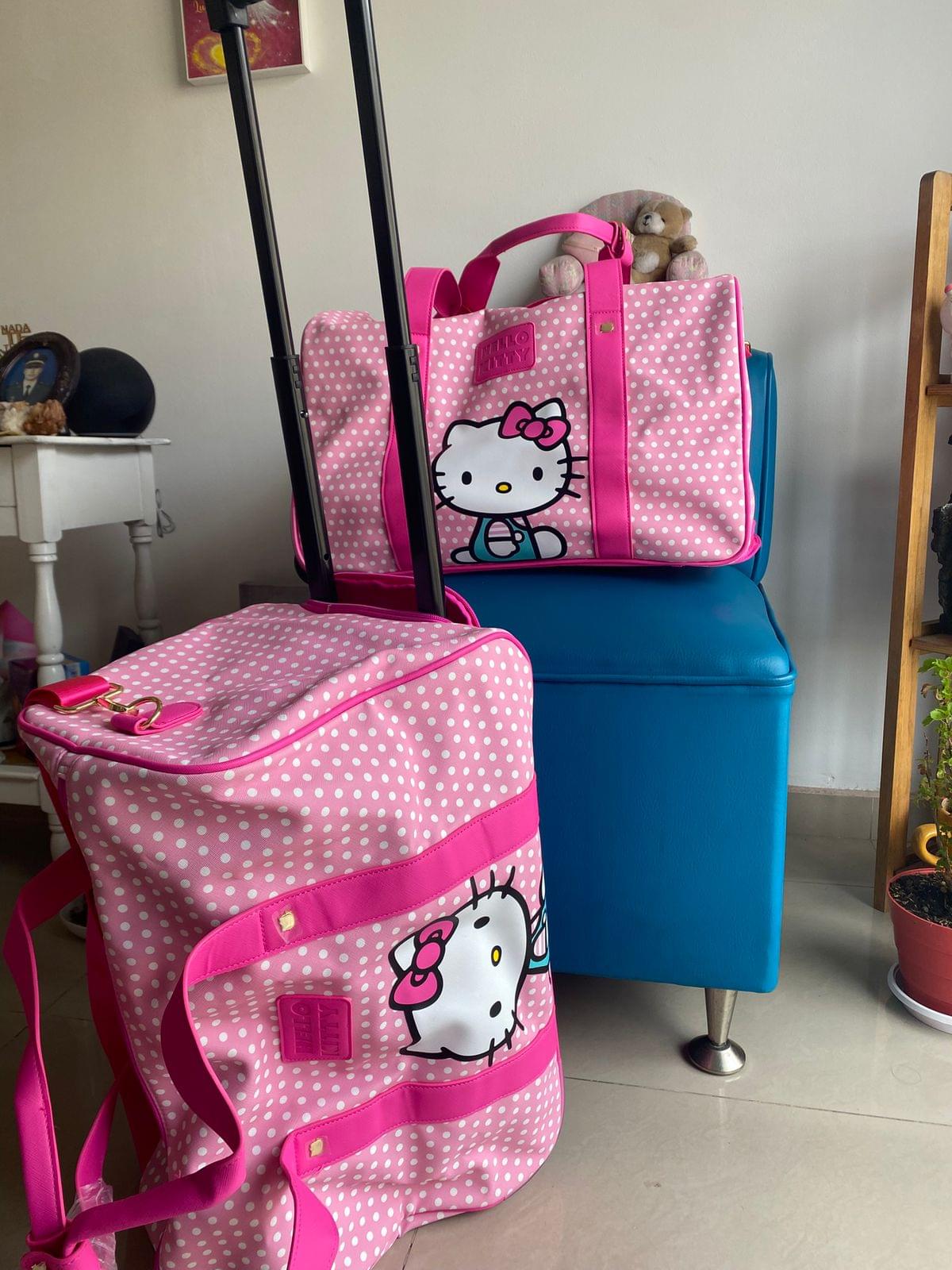 Maleta de viaje Hello Kitty rígida 22″ rosa claro con ruedas giratorias